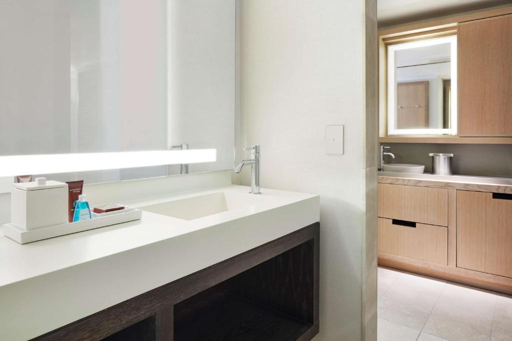 Deluxe Suite with Two Double Beds and Sofa Bed - Image 1
