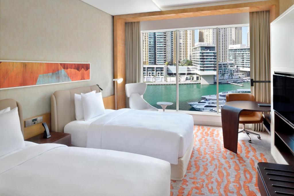 Twin Room with Marina View and Lounge Access - Image 1