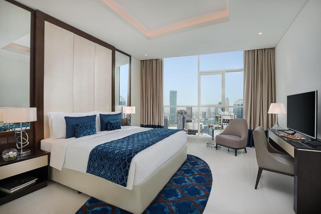 One Bedroom Suite with Private Balcony - Partial Burj Khalifa View - Image 2