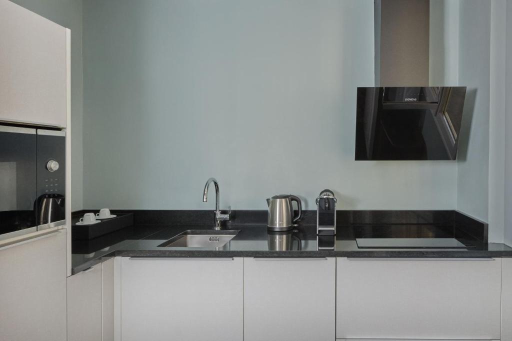 Two-Bedroom Deluxe Suite with Patio View - Image 2