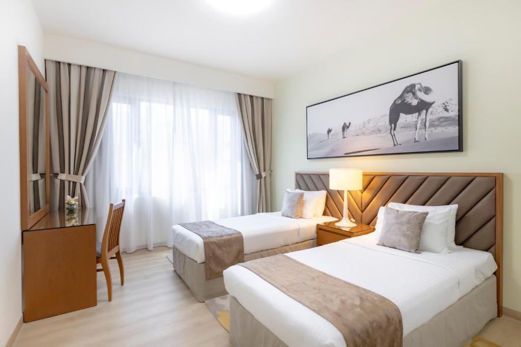 Grand Premier Three Bedroom Suite with Balcony - Image 2