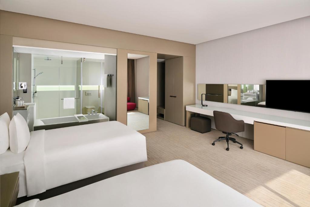 Premium Twin Room with Balcony and Marina View - Image 1