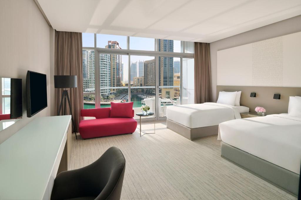 Premium Twin Room with Balcony and Marina View - Image 2