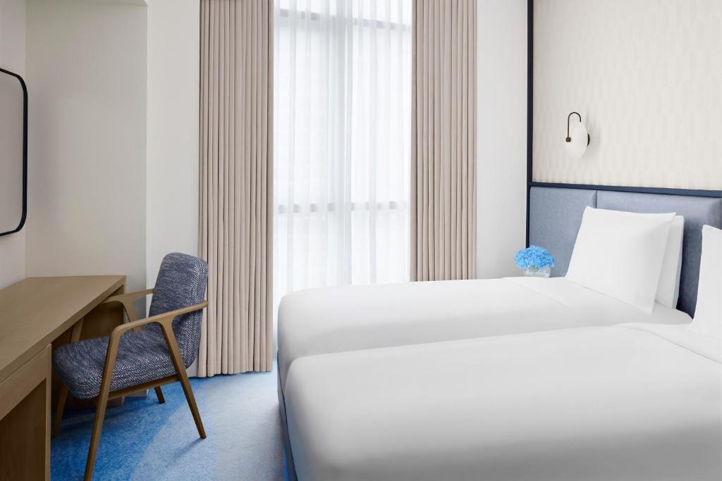 Two-Bedroom Residence with Balcony and View - Image 6