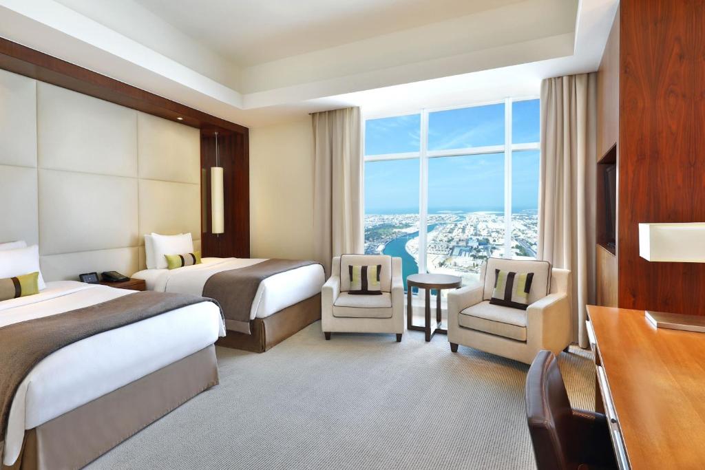 Deluxe Twin Room with Sea View - Image 7