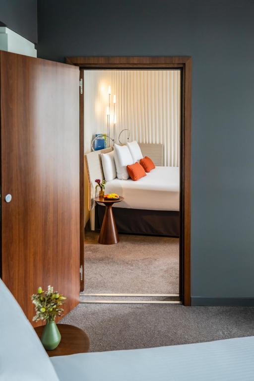 Classic Family Room with Two Connecting Rooms and Pool View - Image 1