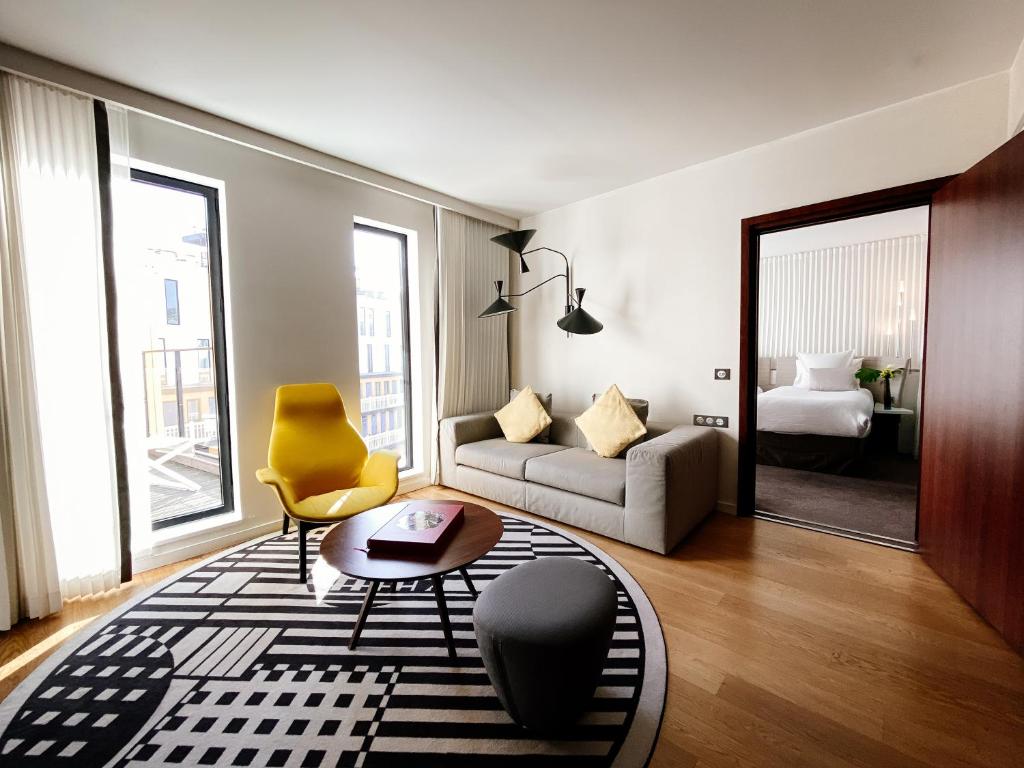 King Suite with Sofa Bed and Lounge Area - Pool View - Image 3