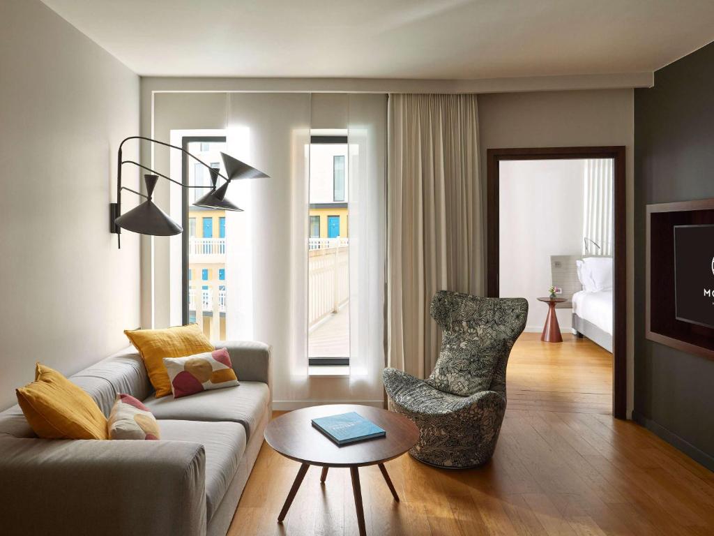 King Suite with Sofa Bed and Lounge Area - Pool View - Image 4