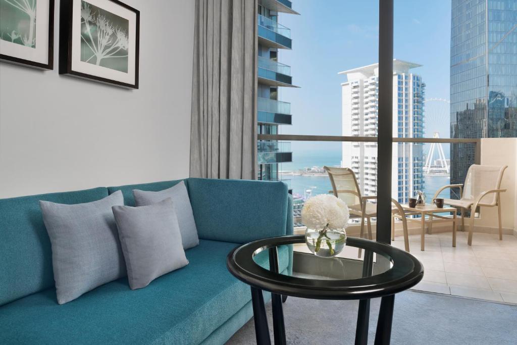 Deluxe King Partial Sea View with Balcony - Image 5