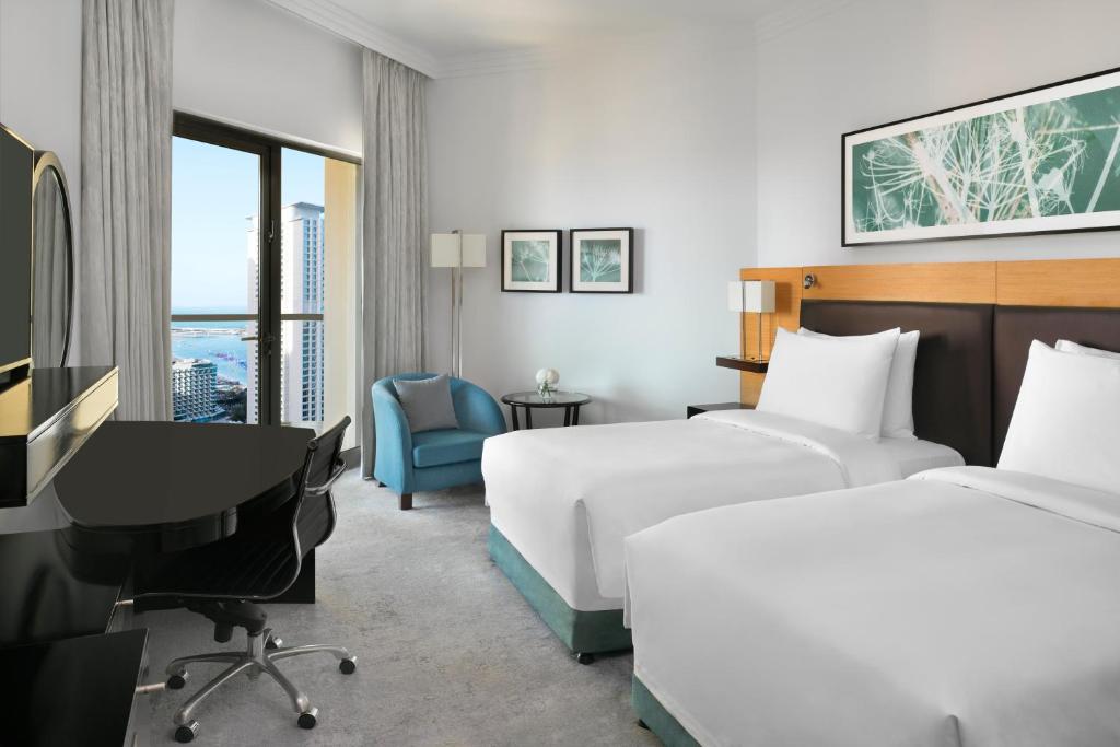 Deluxe Twin Partial Sea View with Balcony - Image 6