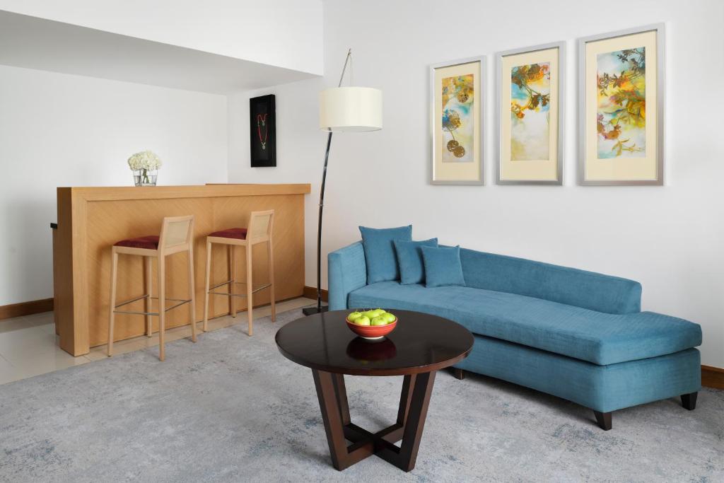 Executive Suite Partial Sea View with Balcony - Image 2