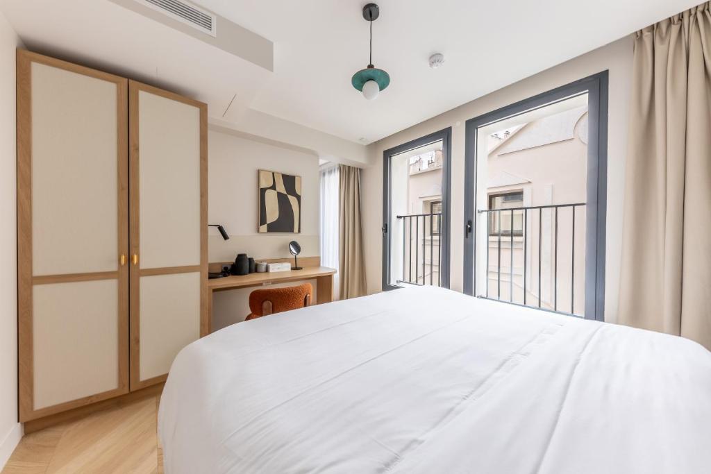 Two-Bedroom Apartment with Balcony and Terrace - Image 19