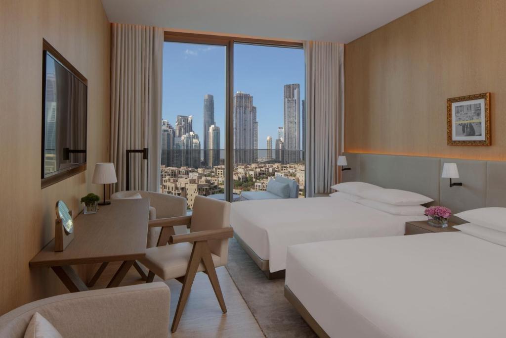 Deluxe Queen Room with Balcony and Burj Khalifa View - Image 1
