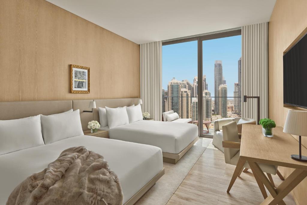 Guest Room with Two Queen Beds and Balcony - Image 4