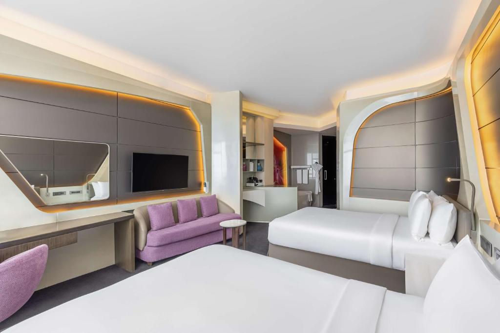 Deluxe Queen Room with Two Queen Beds - Image 1