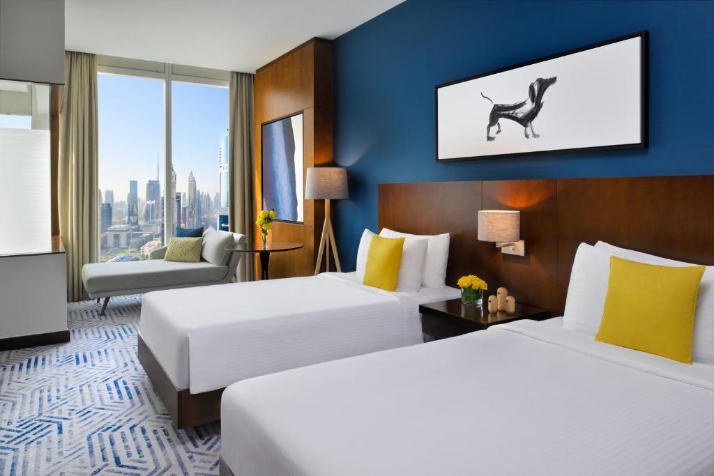 Deluxe Twin Room with City View - Club Room - Image 4