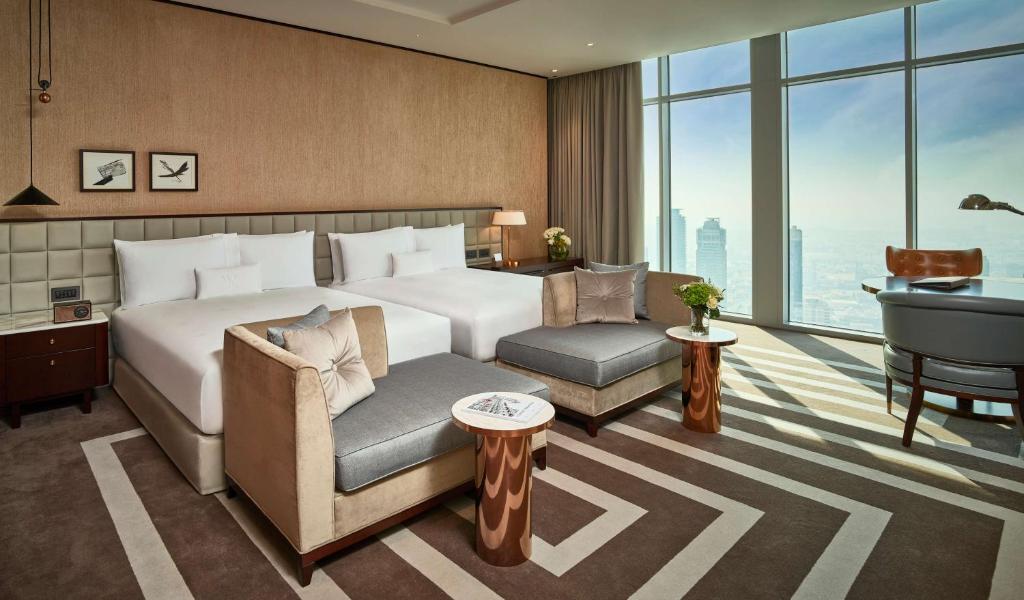Premier Queen Room with Two Queen Beds and Skyline View - Image 1